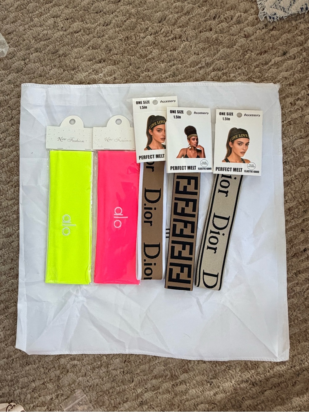 All 5 for $35.00 
Or $8.00 each 
Hair Bands  Neon Yellow, Neon Pink, Beige/Black
